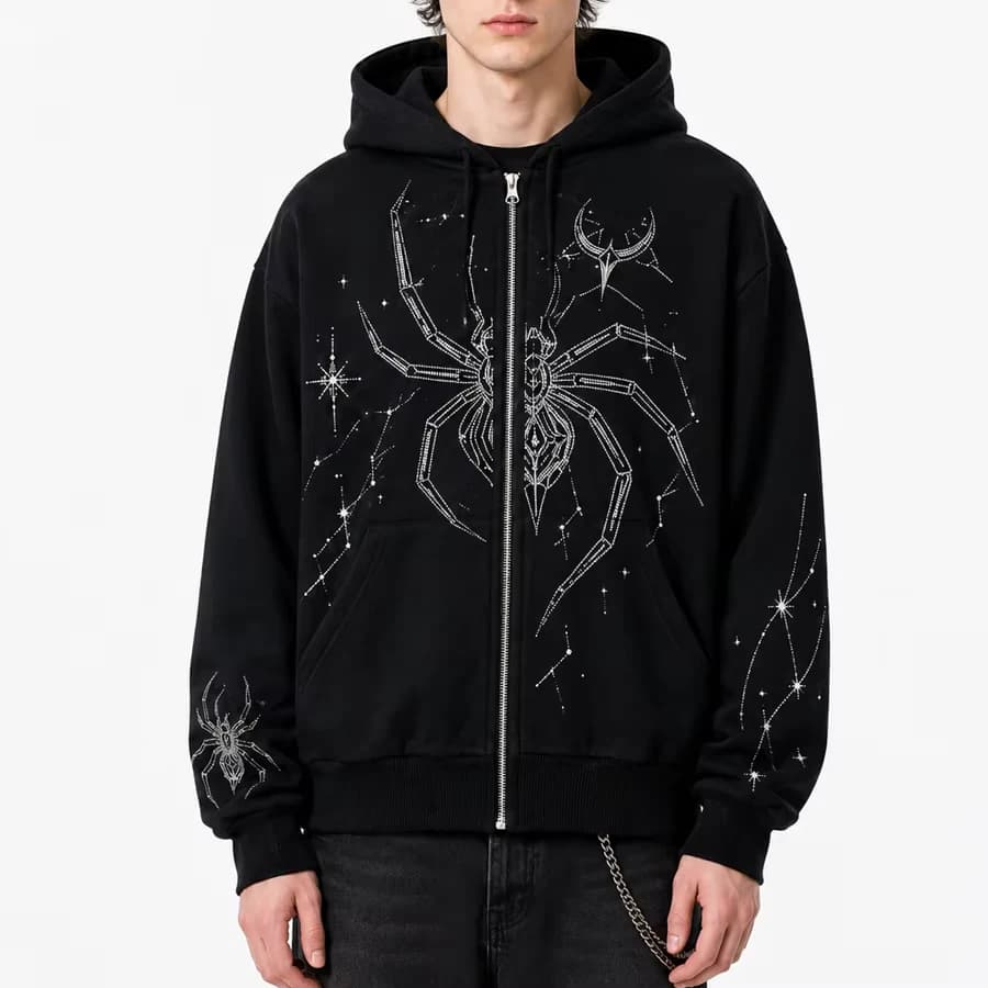 Black oversized rhinestone spider graphic zip-up hoodie visual fit direction