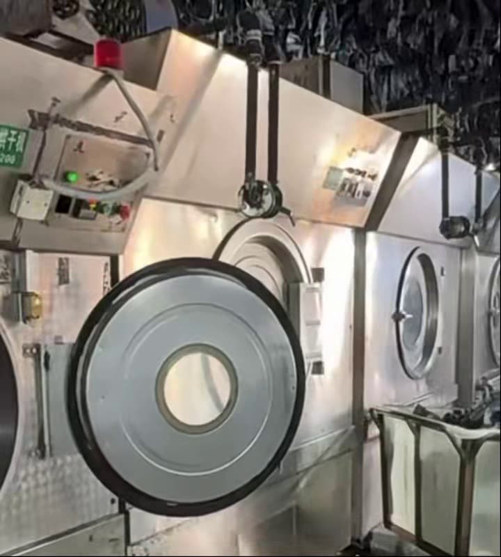 Industrial garment washing machines used for wash and shrinkage control at Meiting Garments