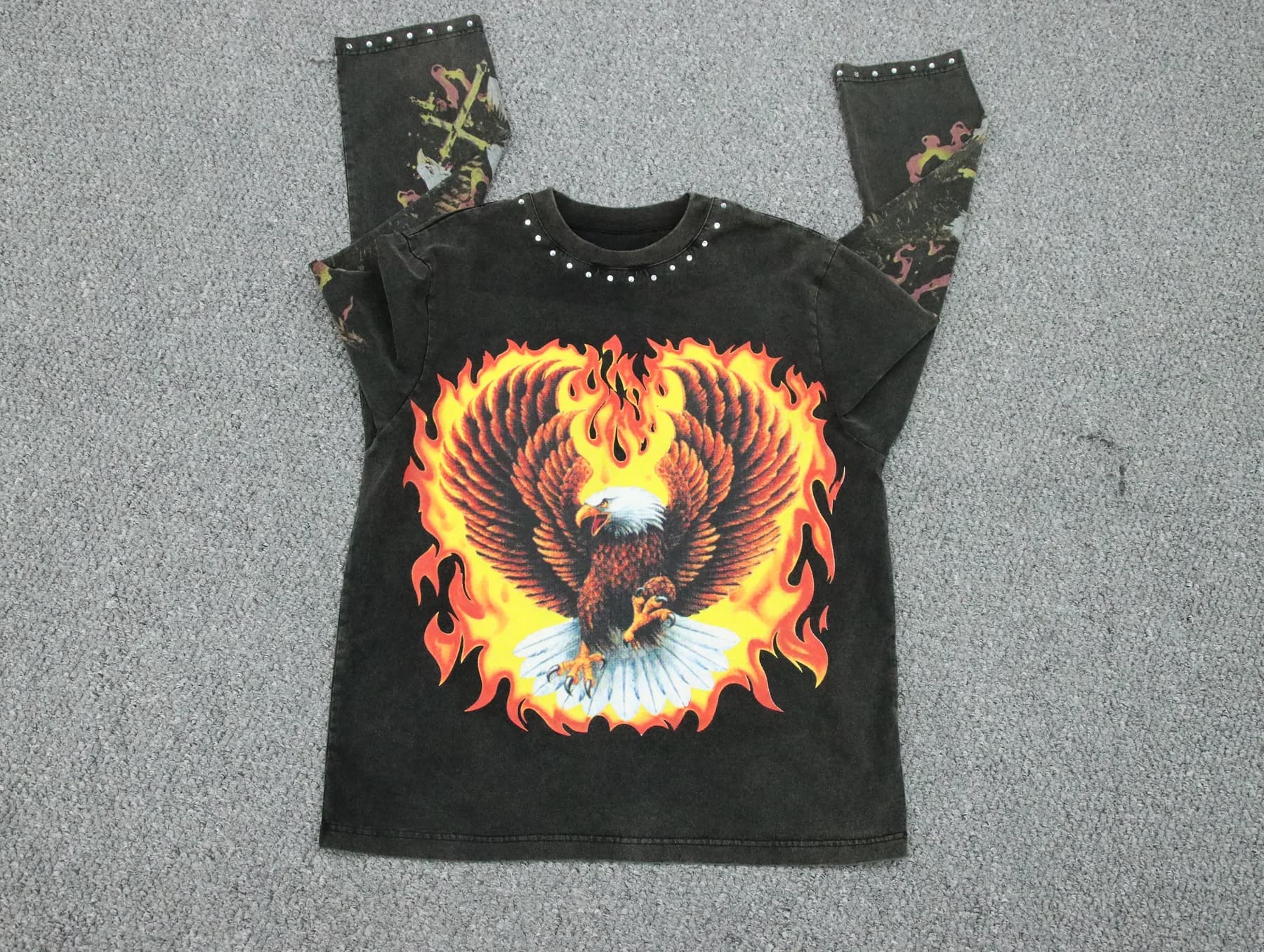 Washed black long-sleeve T-shirt sample with a large multicolor front graphic