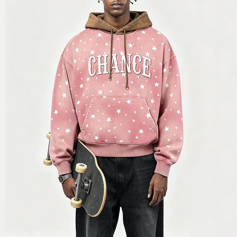 Pink snow wash oversized hoodie model view with contrast hood and graphic print